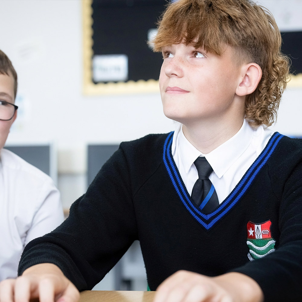 male secondary school child in school uniform